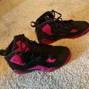 Pink and black Jordan’s